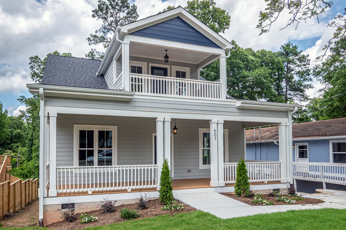 A freshly renovated home with a double front porch